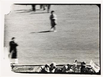 (KENNEDY, PRESIDENT JOHN F.--ASSASINATION) Group of 4 sequential photographs of frames from the Abraham Zapruder film.